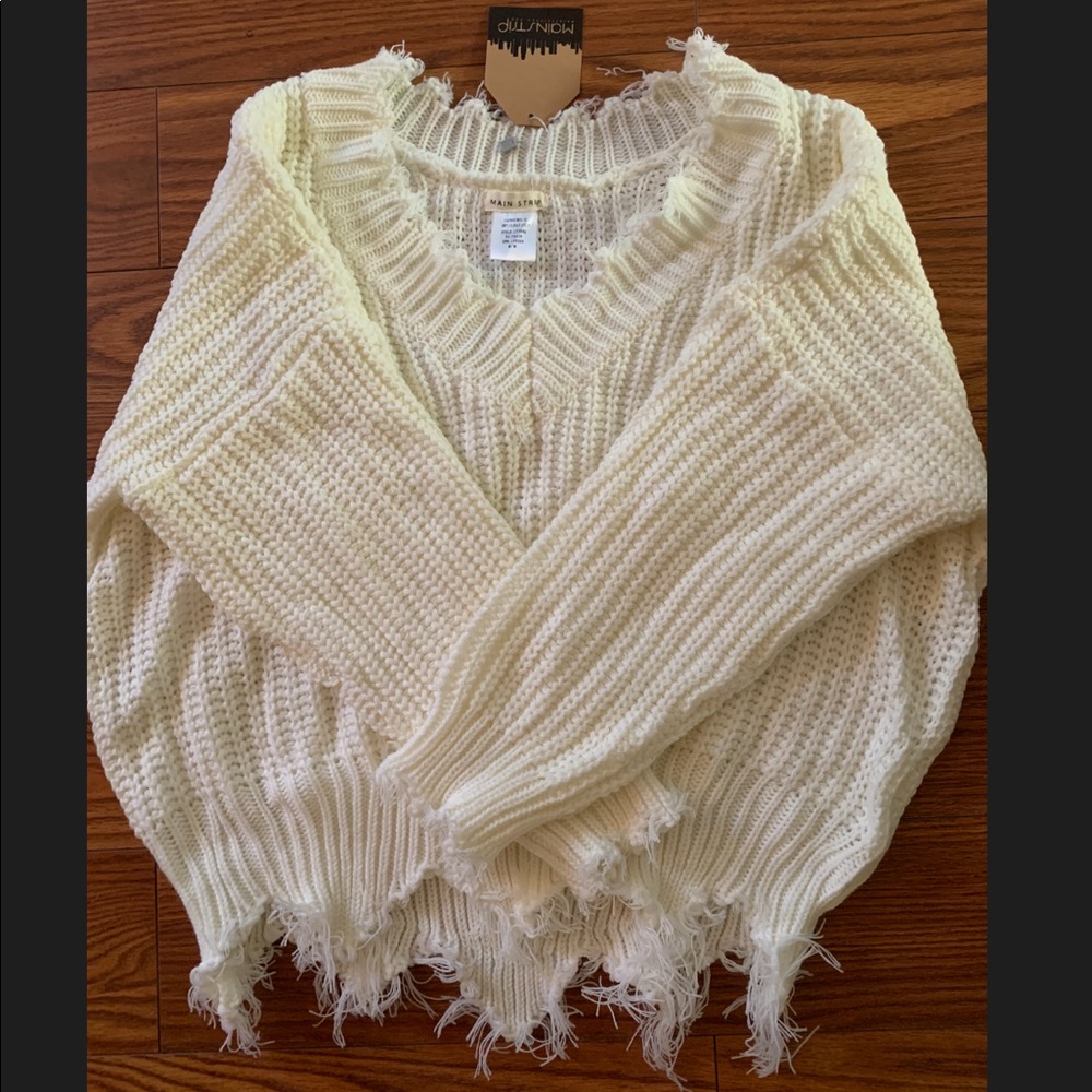 White distressed sweater